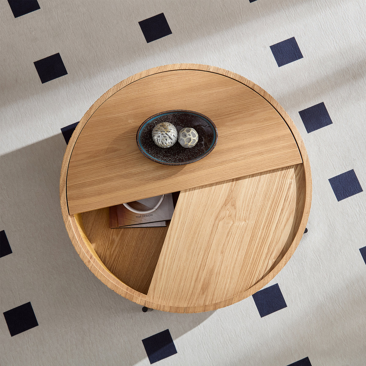 Round coffee table with rotating storage top
